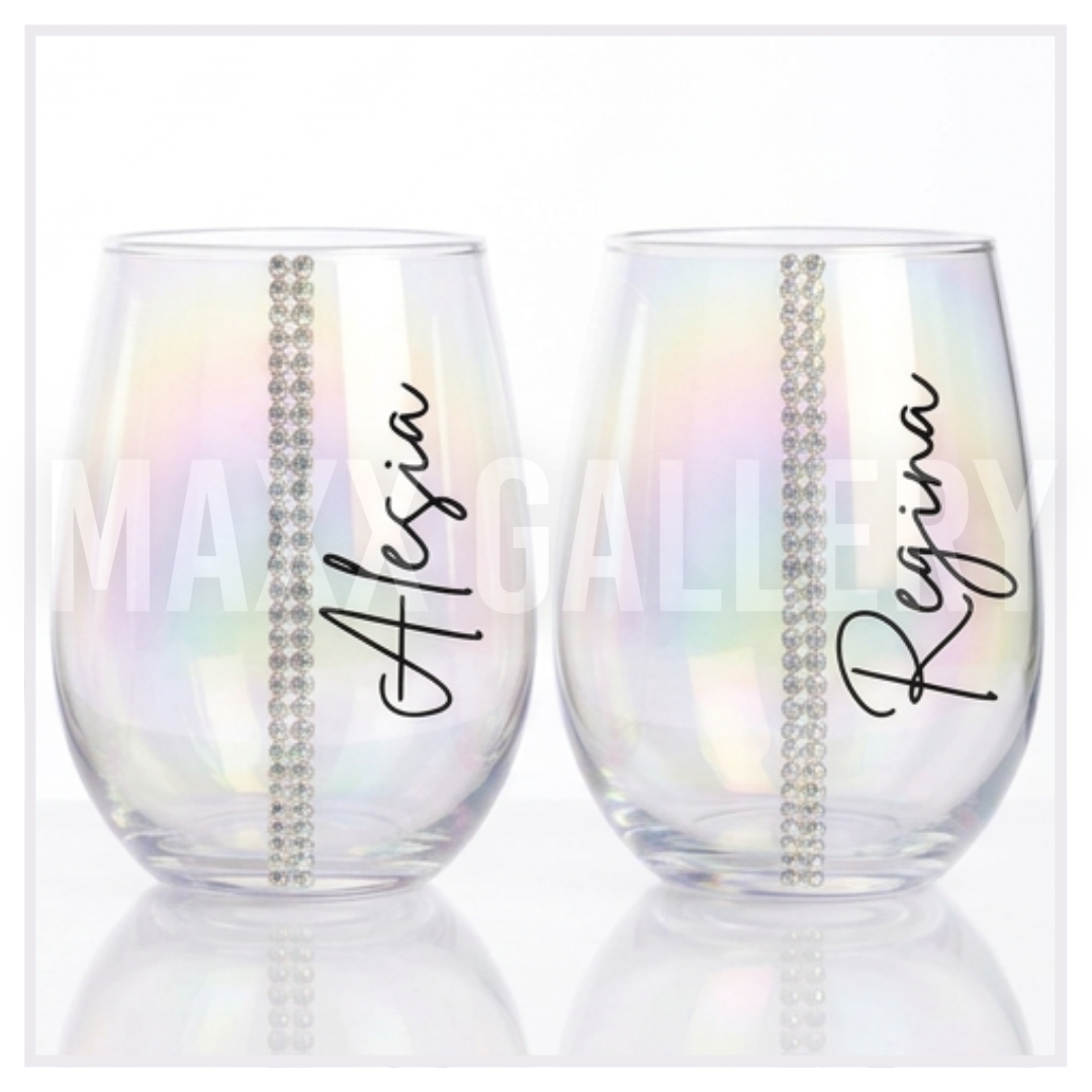 Personalized iridescent stemless wine glass with the name Gwen in black script beside a single row of AB glass crystals ORLANDO NAIL TECH MAXX GALLERY HAND MADE GLASS WARE DRINK WARE CHRISTMAS GIFT BRIDESMAID GIFT BIRTHDAY GIFT ETSY TIKTOK FALL 2026 IRRIDESCENT HOLOGRAPHIC MAXIMIALIST ART