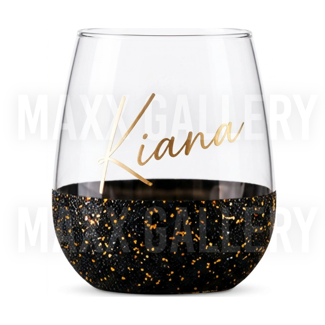 Personalized stemless wine glass with the name Kiana in gold script above a black and gold glitter base
